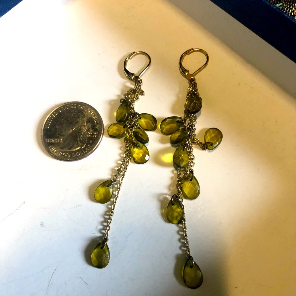 Long dangle earrings with green stones